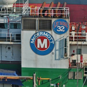 MCDERMOTT LOGO ON DERRICK BARGE NO. 32